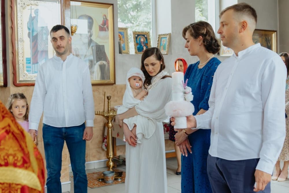 Botezul Evei - Fotografii de Sergiu Cotruta